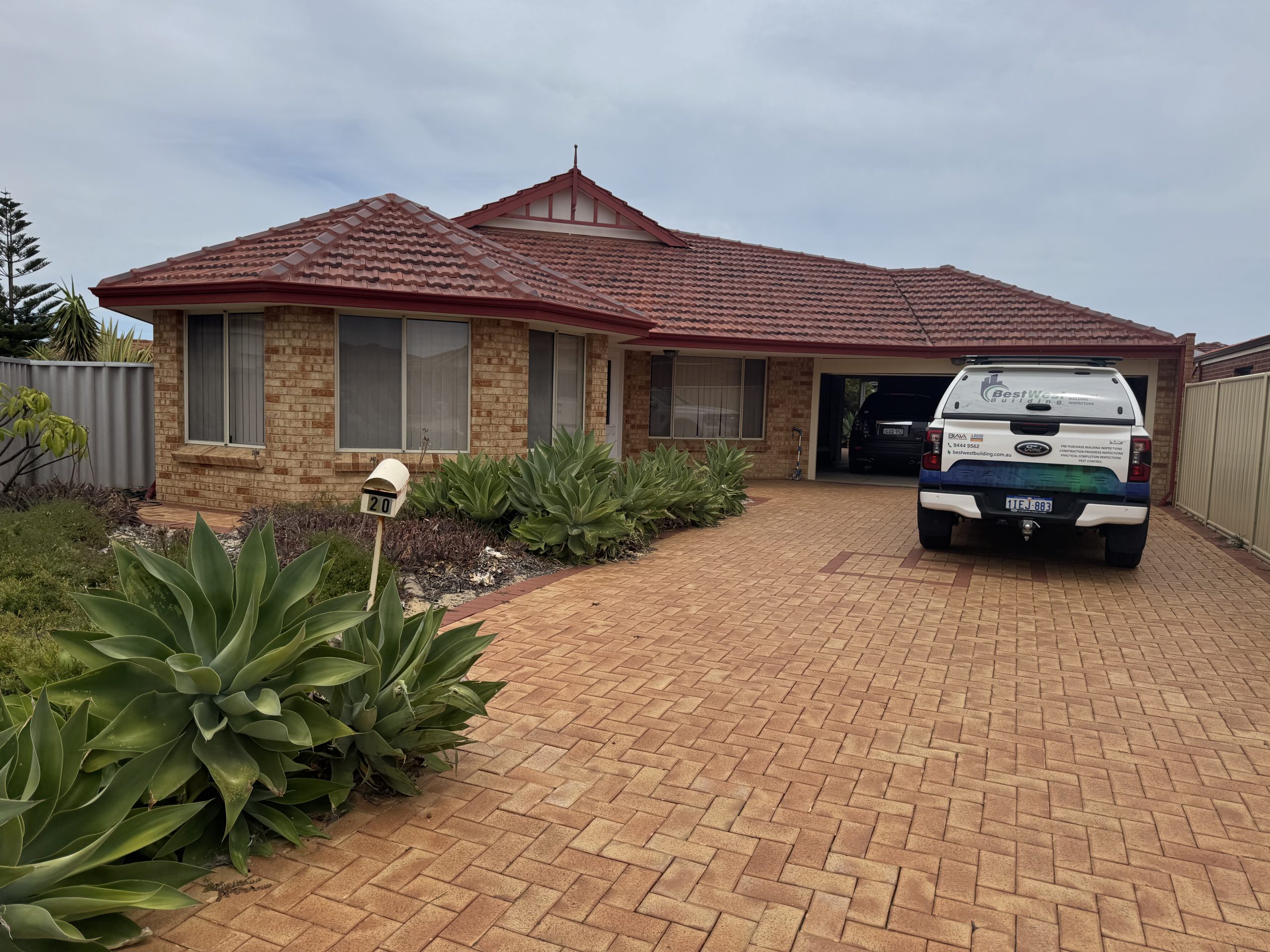 Bestwest Building inspection ute parked at a Perth brick home — first home buyer building inspection Perth